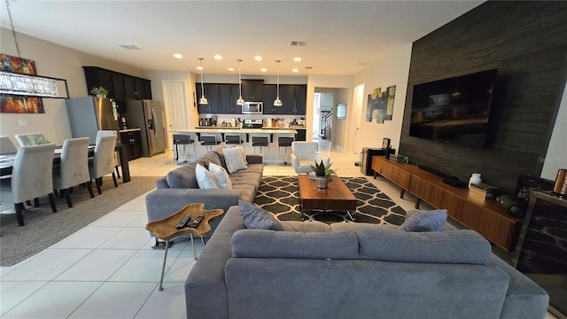 living room featuring light tile patterned floors