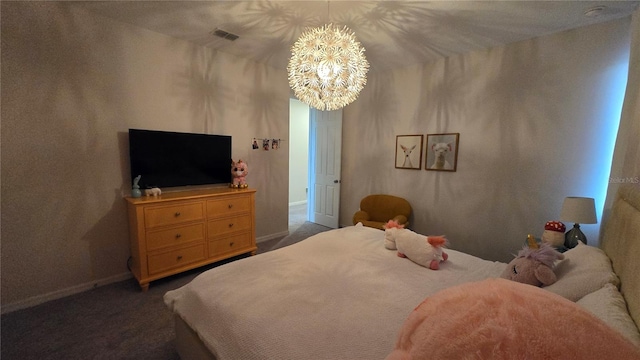 carpeted bedroom featuring a notable chandelier