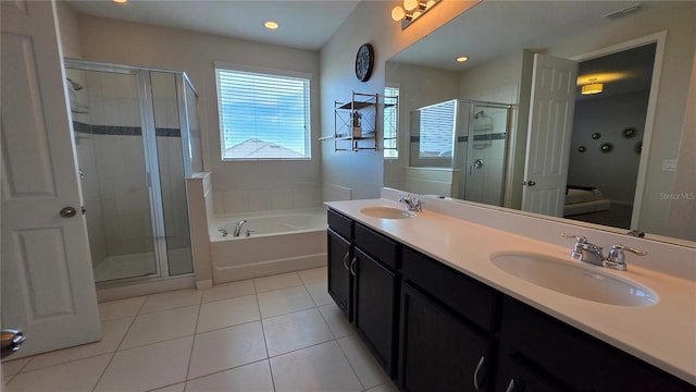 bathroom with vanity, separate shower and tub, and tile patterned flooring