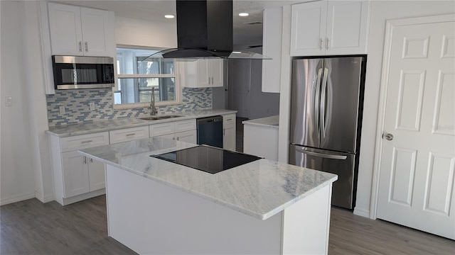 kitchen with island exhaust hood, a center island, white cabinets, and black appliances