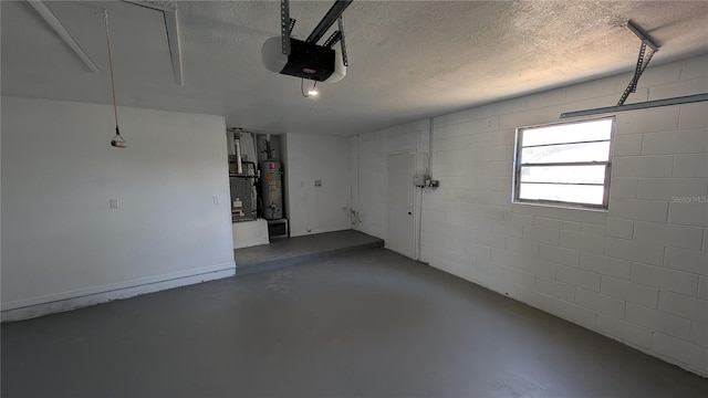 garage featuring a garage door opener and water heater