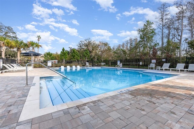 2623 Buena View Rd, Kissimmee, FL 34746 - community pool featuring a patio