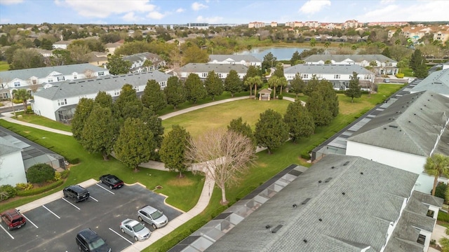 aerial view featuring a water view and a residential view