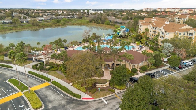 aerial view with a residential view and a water view