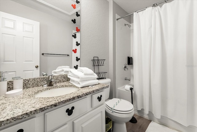 full bathroom with toilet, shower / bath combination with curtain, wood finished floors, and vanity