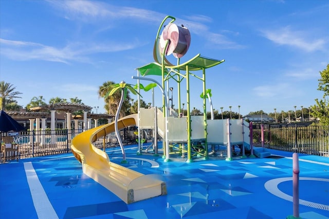 community play area featuring fence