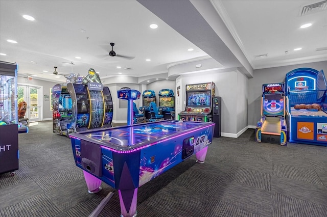 recreation room with recessed lighting, visible vents, dark carpet, and baseboards