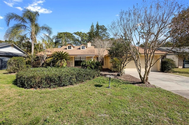 single story home featuring a garage and a front lawn