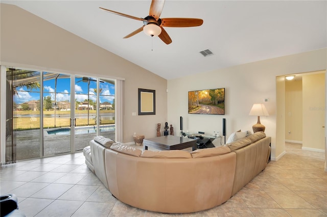 tiled living room with vaulted ceiling and ceiling fan