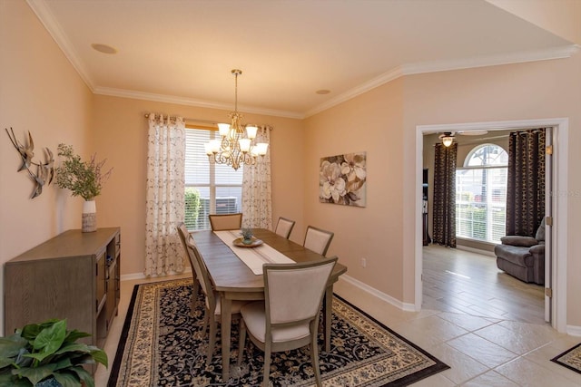 dining area featuring crown molding and a chandelier