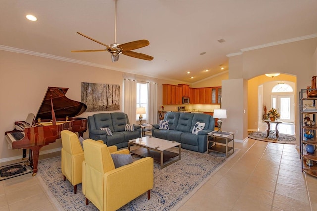 tiled living room with ceiling fan, lofted ceiling, and ornamental molding