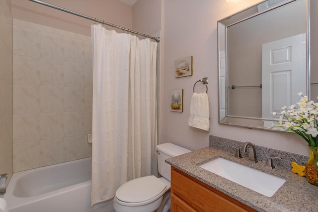 full bathroom featuring vanity, shower / bathtub combination with curtain, and toilet