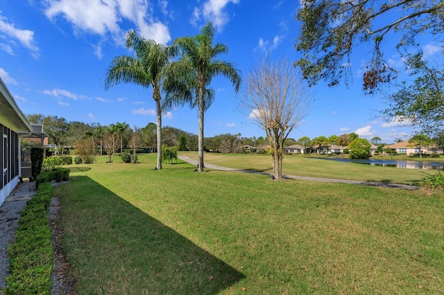 view of yard with a water view