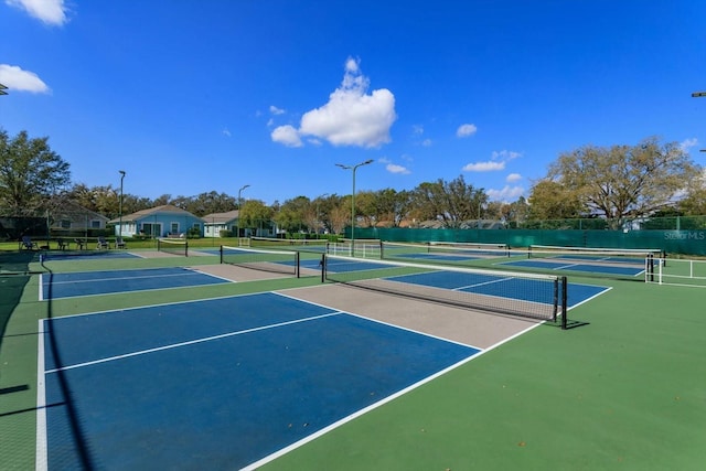 view of tennis court with basketball court