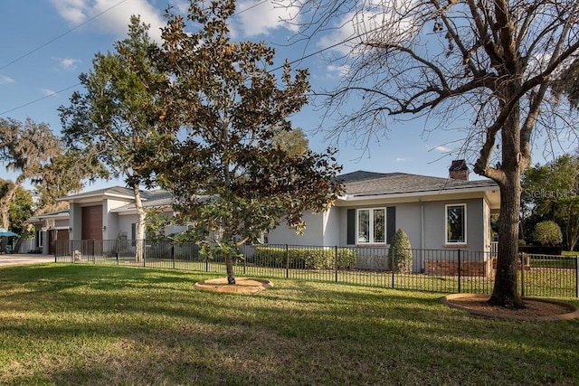 view of front facade with a front yard