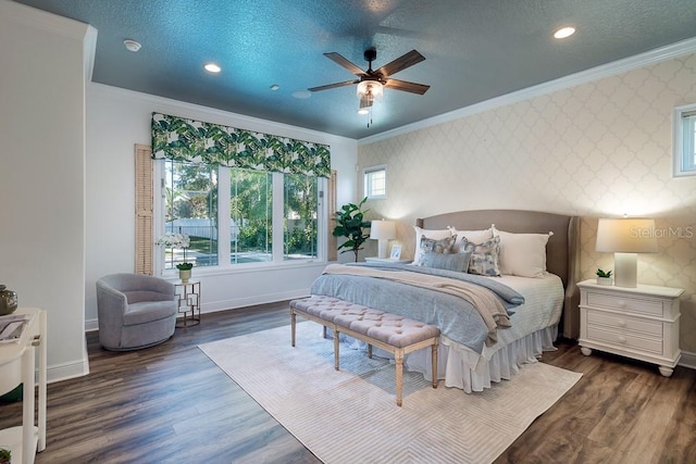 bedroom with crown molding, dark wood-type flooring, and a textured ceiling