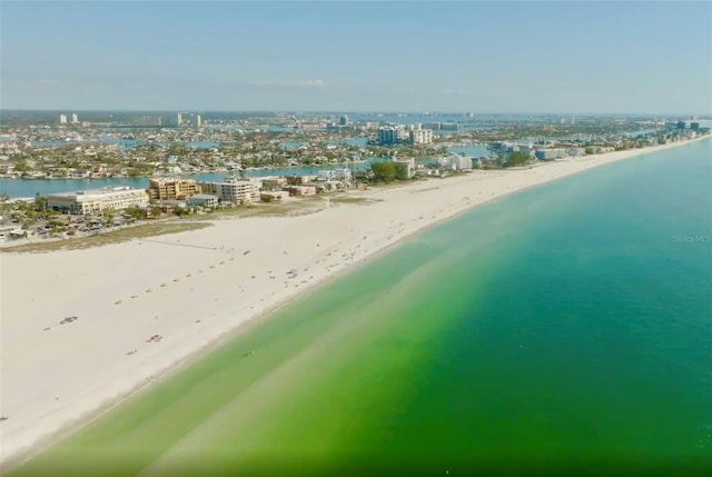 aerial view featuring a water view and a beach view