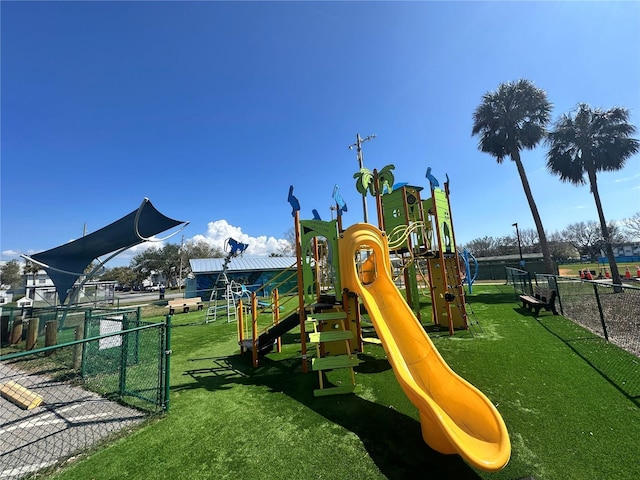 view of playground featuring a lawn