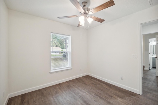 unfurnished room with ceiling fan and dark hardwood / wood-style floors