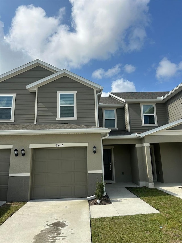 view of front of home with a garage