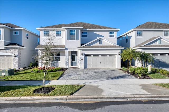 view of front of property with a garage