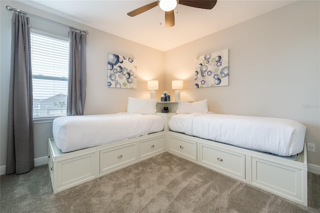 bedroom with light carpet and ceiling fan