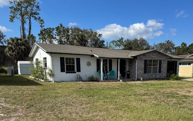 ranch-style home with a front lawn