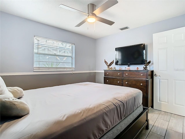 bedroom featuring ceiling fan