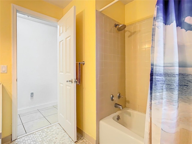 bathroom featuring tile patterned flooring and shower / bath combo with shower curtain