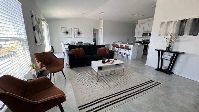 living room with vaulted ceiling