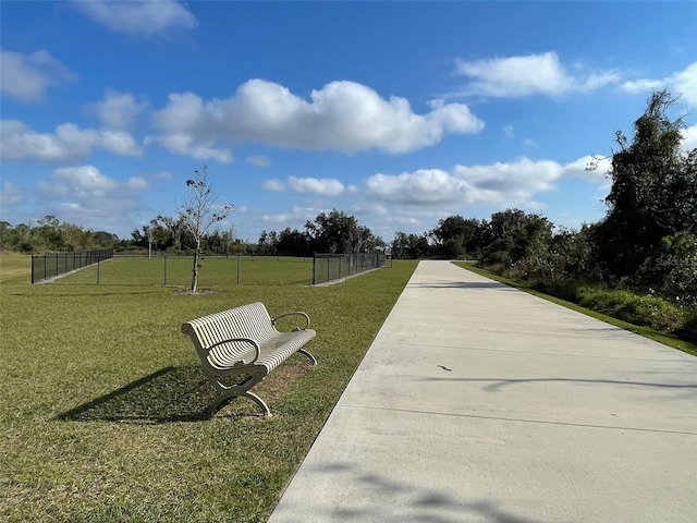 surrounding community featuring a yard