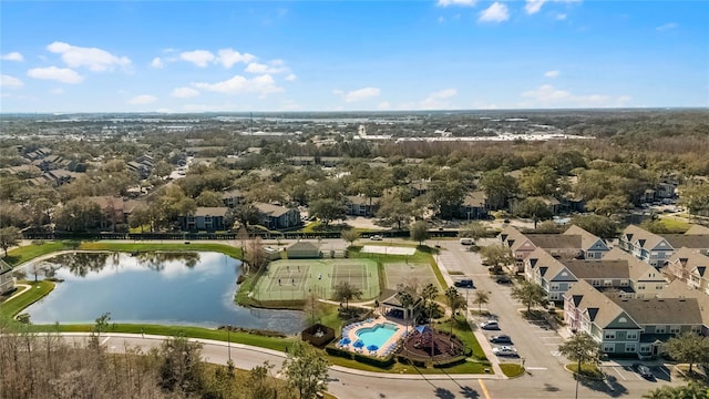 birds eye view of property featuring a water view