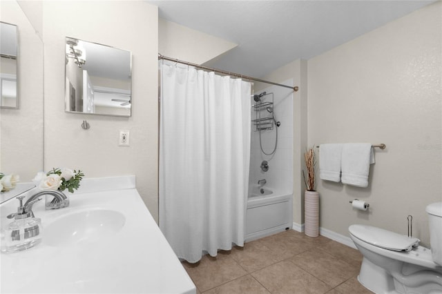 full bathroom featuring shower / bath combination with curtain, tile patterned floors, toilet, and vanity