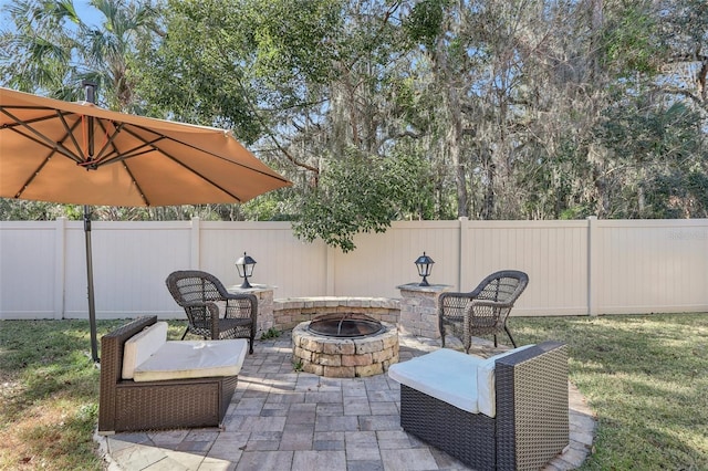 view of patio featuring an outdoor fire pit