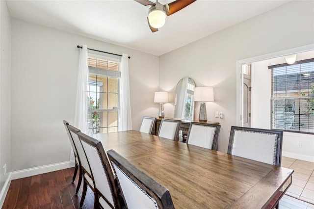 dining room with ceiling fan and light wood-type flooring