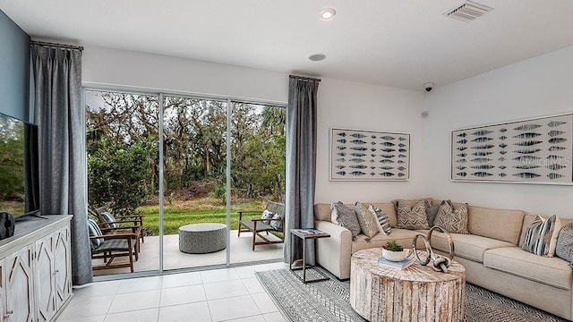 living room featuring light tile patterned flooring