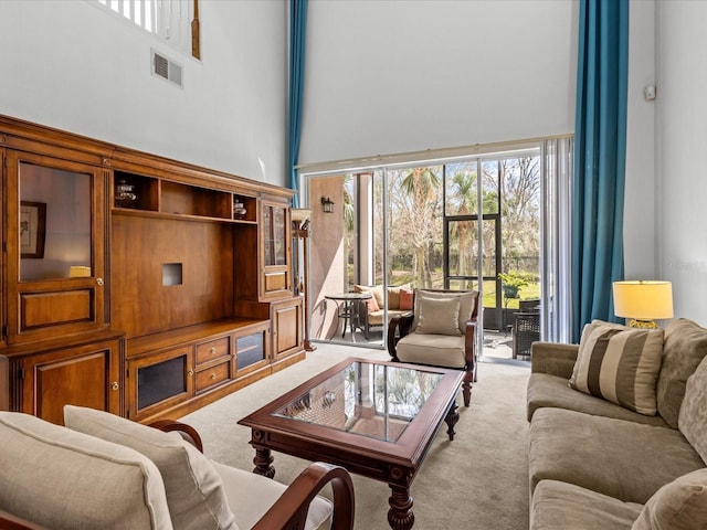 1431 Milledge Ln, Davenport, FL 33896 - carpeted living room with a towering ceiling