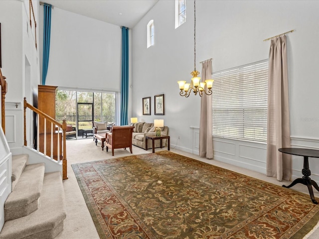 1431 Milledge Ln, Davenport, FL 33896 - interior space with a towering ceiling, carpet flooring, and a chandelier