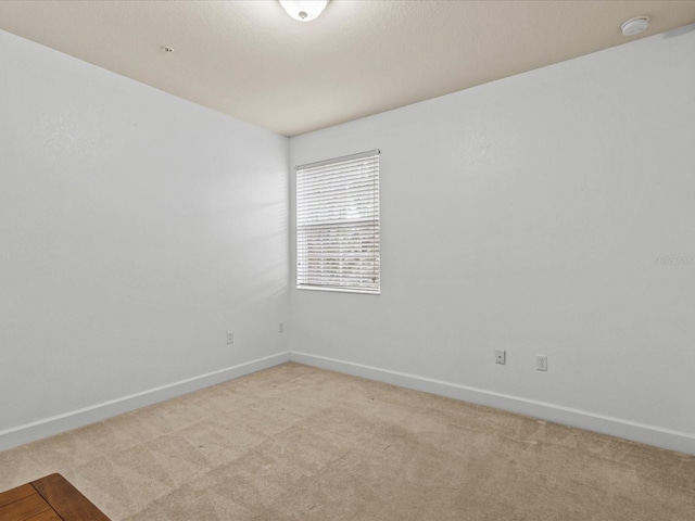 1431 Milledge Ln, Davenport, FL 33896 - unfurnished room with light carpet