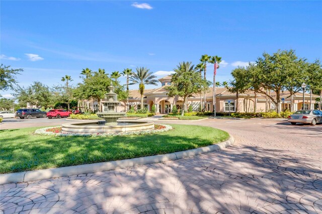1431 Milledge Ln, Davenport, FL 33896 - view of home's community with a yard