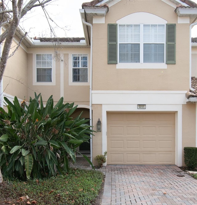 view of front of property with a garage