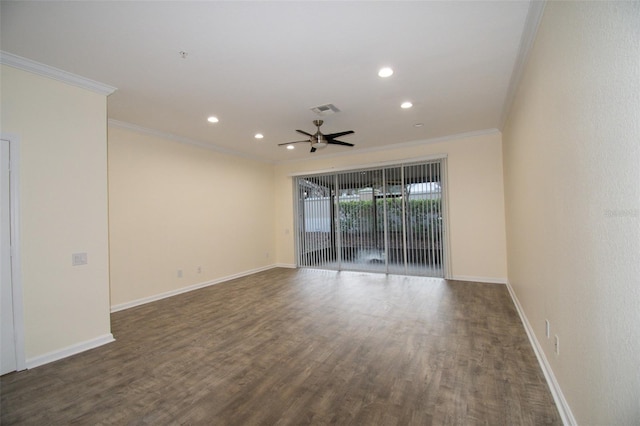 spare room featuring ornamental molding, dark hardwood / wood-style floors, and ceiling fan