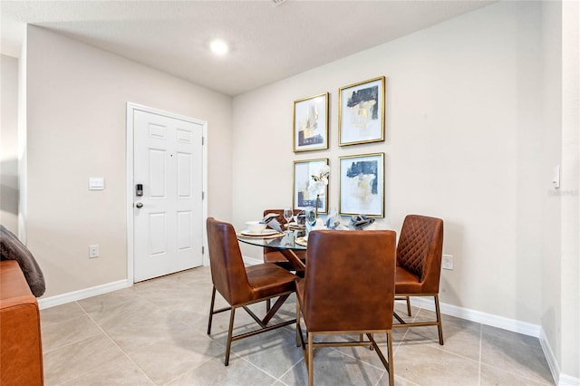 view of tiled dining space