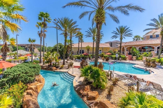 view of swimming pool with a patio area