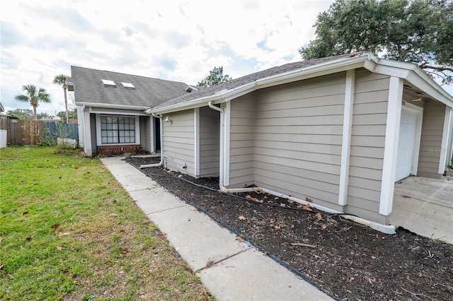 exterior space with a front lawn