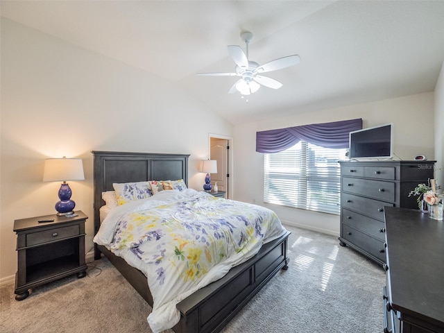 carpeted bedroom with lofted ceiling and ceiling fan