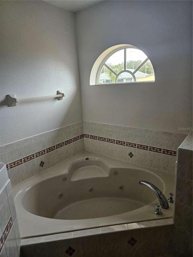 bathroom featuring a jetted tub