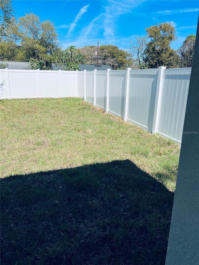 view of yard featuring fence