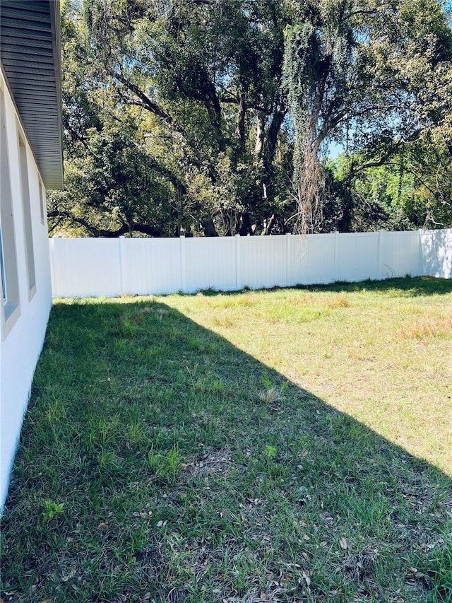 view of yard with fence