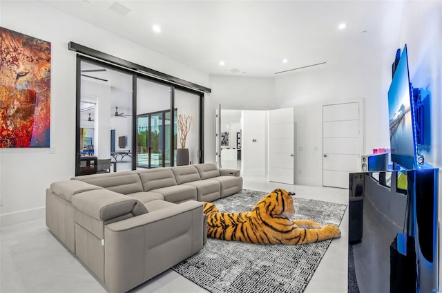 living room featuring ceiling fan